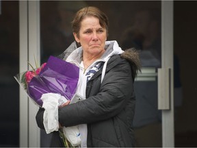 Susan McDonald attends a vigil for the victims of the Humboldt Broncos junior hockey team, at Lighthouse Church in Ladner.