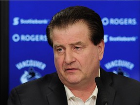 Jim benning talks to media as they wrap up their season with a final press conference in West Vancouver, BC., April 9, 2018.