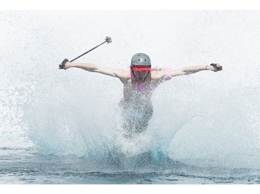 Eric Moons makes a big splash as competes in the Grouse Mountain Slush Cup where competitors attempt to cross a pool of slush on their skis or board, North Vancouver  April 21 2018.