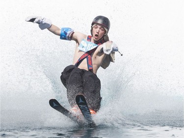 Jordan Halonko makes a big splash as competes in the Grouse Mountain Slush Cup where competitors attempt to cross a pool of slush on their skis or board, North Vancouver  April 21 2018.