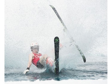 Vanya Rumyansev crashes into the water at the Grouse Mountain Slush Cup where competitors attempt to cross a pool of slush on their skis or board, North Vancouver  April 21 2018.