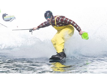 Jeremy participates in the Grouse Mountain Slush Cup where competitors attempt to cross a pool of slush on their skis or board, North Vancouver  April 21 2018.