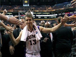 This April 25, 2012, file photo, shows Phoenix Suns' Steve Nash leaving the court after an NBA basketball game against the San Antonio Spurs in Phoenix. (AP Photo/Matt York, File)