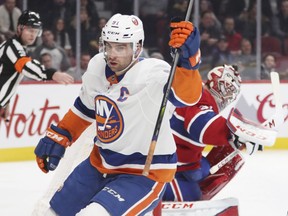 New York Islanders' John Tavares celebrates his short-handed goal against Montreal Canadiens' Carey Price during second period of NHL action in Montreal, Jan. 15, 2018.