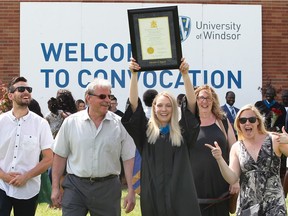 Windsor, Ontario. May 30, 2018. University of Windsor graduate Kyra Wardell, 21, celebrates with boyfriend Zach Farina, left, father Kevin Wardell, mother Tina Wardell and sister Sydney Boersma, right, May 30, 2018.