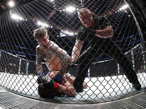 Gregor Gillespie beats up on Jordan Rinaldi at UFC Fight Night at Spectrum Center in Charlotte, N.C., on Jan. 27, 2018. (Streeter Lecka, Getty Images files)
