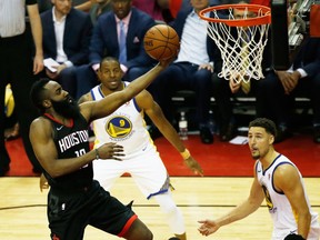 James Harden of the Houston Rockets shoots against the Golden State Warriors in the second half of Game Two of the Western Conference Finals of the 2018 NBA Playoffs at Toyota Center on May 16, 2018 in Houston, Texas.