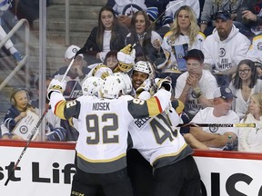 Ryan Reaves of the Vegas Golden Knights celebrates with teammates after scoring a second period goal against the Winnipeg Jets in Game Five of the Western Conference Finals.