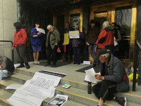 A number of social housing protesters have blocked the doors to Vancouver City Hall on Tuesday, May 1, 2018.