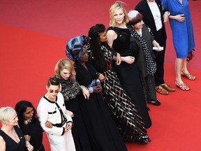 (From 3rd L) U.S. actress and member of the Feature Film Jury Kristen Stewart, Burundian singer and member of the Feature Film Jury Khadja Nin, U.S. director and screenwriter and member of the Feature Film Jury Ava DuVernay, Australian actress Cate Blanchett and French director Agnes Varda walk the red carpet in protest of the lack of female filmmakers honoured throughout the history of the festival at the screening of "Girls Of The Sun (Les Filles Du Soleil)" during the 71st annual Cannes Film Festival at the Palais des Festivals on May 12, 2018 in Cannes, southeastern France.