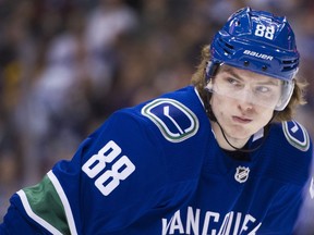 Canucks centre Adam Gaudette watches the play during an NHL game against the Edmonton Oilers in Vancouver on March 29.