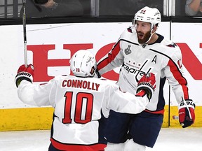 Brooks Orpik of the Washington Capitals is congratulated by teammate Brett Connolly after scoring at T-Mobile Arena on May 30, 2018 in Las Vegas. (Ethan Miller/Getty Images)