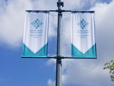 Signs marking the Aga Khan's Diamond Jubilee are seen near Ismaili Centre Burnaby.