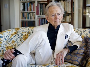 American author and journalist Tom Wolfe in his living room in New York in July 2016. Wolfe died at a New York City hospital in May 2018. He was 88.