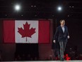 Bill Morneau, Minister of Finance, walks on stage before delivering a speech at the federal Liberal national convention in Halifax on Saturday, April 21, 2018. Morneau will provide an update Wednesday on the status of his talks with Kinder Morgan to expedite the Trans Mountain pipeline expansion _ but he is not expected to announce a deal.