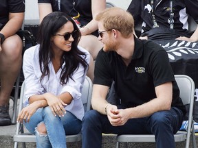 Prince Harry and Meghan Markle attend the wheelchair tennis competition during the Invictus Games in Toronto on Monday, September 25, 2017.