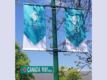 Signs marking the Aga Khan's Diamond Jubilee are seen on Canada Way near the Ismaili Centre Burnaby.