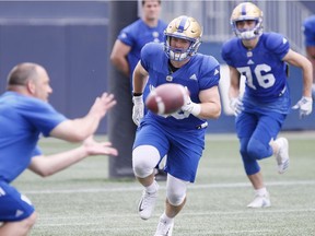 New addition to the Winnipeg Blue Bombers Adam Bighill (50) runs through drills at a pre-season training camp in Winnipeg, Thursday, May 24, 2018.