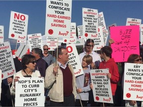 Vancouver residents gather at Trimble Park on Tuesday to protest a new property-tax levied by the NDP government.