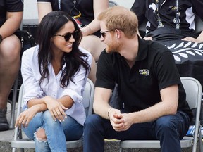 Prince Harry and Meghan Markle attend the wheelchair tennis competition during the Invictus Games in Toronto on Monday, September 25, 2017.