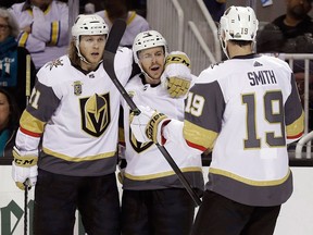 Vegas Golden Knights' Jonathan Marchessault, centre, celebrates his goal with teammates William Karlsson and Reilly Smith during Game 6 against the San Jose Sharks on May 6.