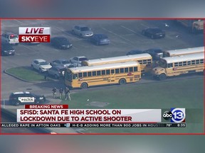 In this image taken from video law enforcement officers respond to a high school near Houston after an active shooter was reported on campus, Friday, May 18, 2018, in Santa Fe, Texas. The Santa Fe school district issued an alert Friday morning saying Santa Fe High School has been placed on lockdown. (KTRK-TV ABC13 via AP)