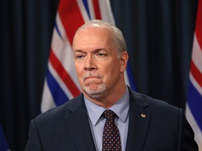 B.C. Premier John Horgan speaks about the decision by the federal government to buy the Trans Mountain pipeline from Kinder Morgan at the legislature in Victoria on May 29.