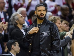 Rapper Drake watches playoff action against the Cleveland Cavaliers at the Air Canada Centre at the Air Canada Centre in Toronto, Ont. on Tuesday May 1, 2018. Ernest Doroszuk/Toronto Sun/Postmedia Network