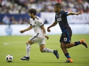 Felipe of the Vancouver Whitecaps, left, will be trying to exploit holes in the New England Revolution's defence on Saturday afternoon at B.C. Place Stadium in Vancouver.