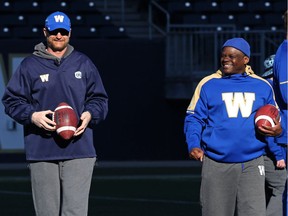 Head coach Mike O'Shea (left) and defensive co-ordinator Richie Hall together during an early morning session at Winnipeg Blue Bombers mini-camp in Winnipeg on Thurs., April 26, 2018.