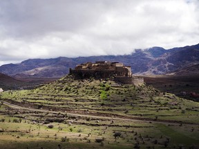 A Kasbah is seen atop a hilltop in the Anti-Atlas Mountains in Morocco.