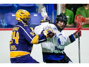 Dane Dobbie of the Langley Thunder, right, scored four goals Wednesday night and has been a great addition for the Western Lacrosse Association squad, which beat the Coquitlam Adanacs 8-7 and improved to 2-4 in the standings.