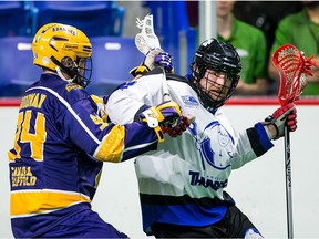 Dane Dobbie (right) in action for the Western Lacrosse Association’s Langley Thunder last year.