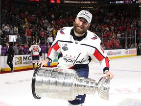 Washington Capitals forward Brett Connolly hoists the Stanley Cup after the Caps beat the Vegas Golden Knights 4-3 in Game 5 of the NHL final in Las Vegas earlier this month.