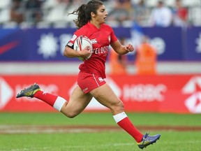 Bianca Farella of Canada breaks away to score a try during the Women's Cup semi final between New Zealand and Canada during the HSBC Paris Sevens at Stade Jean Bouin on June 9, 2018 in Paris, France.