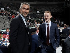Vancouver Canucks' president of hockey operations Trevor Linden talks with Tyler Madden after the youngster was selected 68th overall on Saturday at the NHL Entry Draft at American Airlines Center in Dallas, Texas.