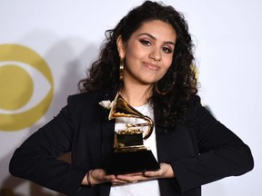 Canadian singer and songwriter Alessia Cara, winner of the Best New Artist award, poses in the press room during the 60th Annual Grammy Awards on January 28, 2018, in New York.