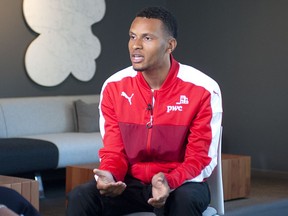 Canadian sprinter Andre De Grasse speaks to the media in Vancouver at the Telus Garden on June 25 before the start of the Harry Jerome International Track Classic in Burnaby, June 26 and 27.