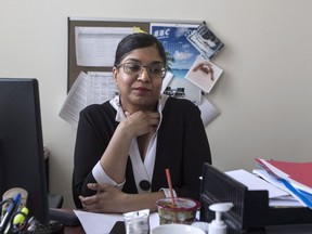 Dying with Dignity Canada's CEO Shanaaz Gokool sits in her office.