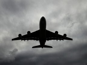 An Airbus SE A380 aircraft operated by Qantas Airways Ltd. flies approaches to land at Sydney Airport in Sydney, Australia, on Tuesday, Feb. 20, 2018.