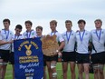 Some members of the Oak Bay Barbarians celebrate with the championship banner after beating Shawnigan Lake in the B.C. Quad-A boys rugby championship final in Abbotsford on the weekend of June 2-3, 2018. Left to right: Gavin Termuende, Alex Pasula, Cole Friegang, Spencer Hoffman, captain Tom Abercrombie (holding the Woodward Shield) Jack Carson, Nick Bamford and Conor Hills.