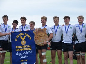 Some members of the Oak Bay Barbarians celebrate with the championship banner after beating Shawnigan Lake in the B.C. Quad-A boys rugby championship final in Abbotsford on the weekend of June 2-3, 2018. Left to right: Gavin Termuende, Alex Pasula, Cole Friegang, Spencer Hoffman, captain Tom Abercrombie (holding the Woodward Shield) Jack Carson, Nick Bamford and Conor Hills.