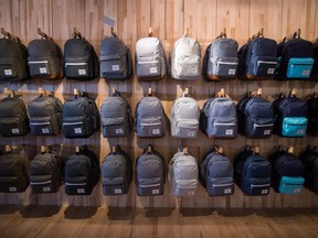 Backpacks are displayed at Herschel Supply Company's new flagship and first North American store, in Vancouver on June 11.
