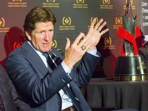 Mike Babcock, head coach of the Toronto Maple Leafs speaks at a Hockey Canada press conference along with Ryan Smyth and Danielle Goyette, all three are 2018 Distinguished Honourees of the Order of Hockey in Canada.  Photograph taken on Monday June 18, 2018.