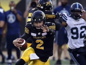 Hamilton Tiger-Cats quarterback Johnny Manziel (2) heads up field on a broken play during pre-season CFL action in Hamilton on Friday June 1, 2018. (Jack Boland/Toronto Sun)