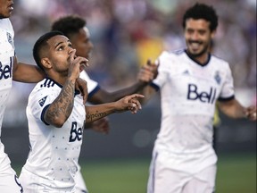 Vancouver Whitecaps midfielder Cristian Techera (13) celebrates his goal against the Colorado Rapids during the first half of an MLS soccer match Friday, June 1, 2018, in Commerce City, Colo.