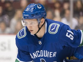 The Vancouver Canucks have re-signed defenceman Troy Stecher to a two-year contract.