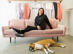 Miriam Alden at her Brunette the Label flagship store with her boxer Frederick.
