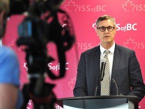 Chris Friesen, director of settlement services at the Immigrant Services Society of B.C., talks to media following the release of a report that examines the experiences of recent refugee claimants or asylum seekers.