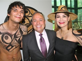 Painted models Eric Zachary and Evie Dumont and Bill Reid Gallery Anniversary party chair Douglas Reynolds greeted gala guests.